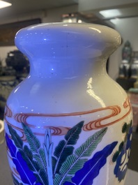 A pair of Chinese wucai rouleau vases, 19th C.